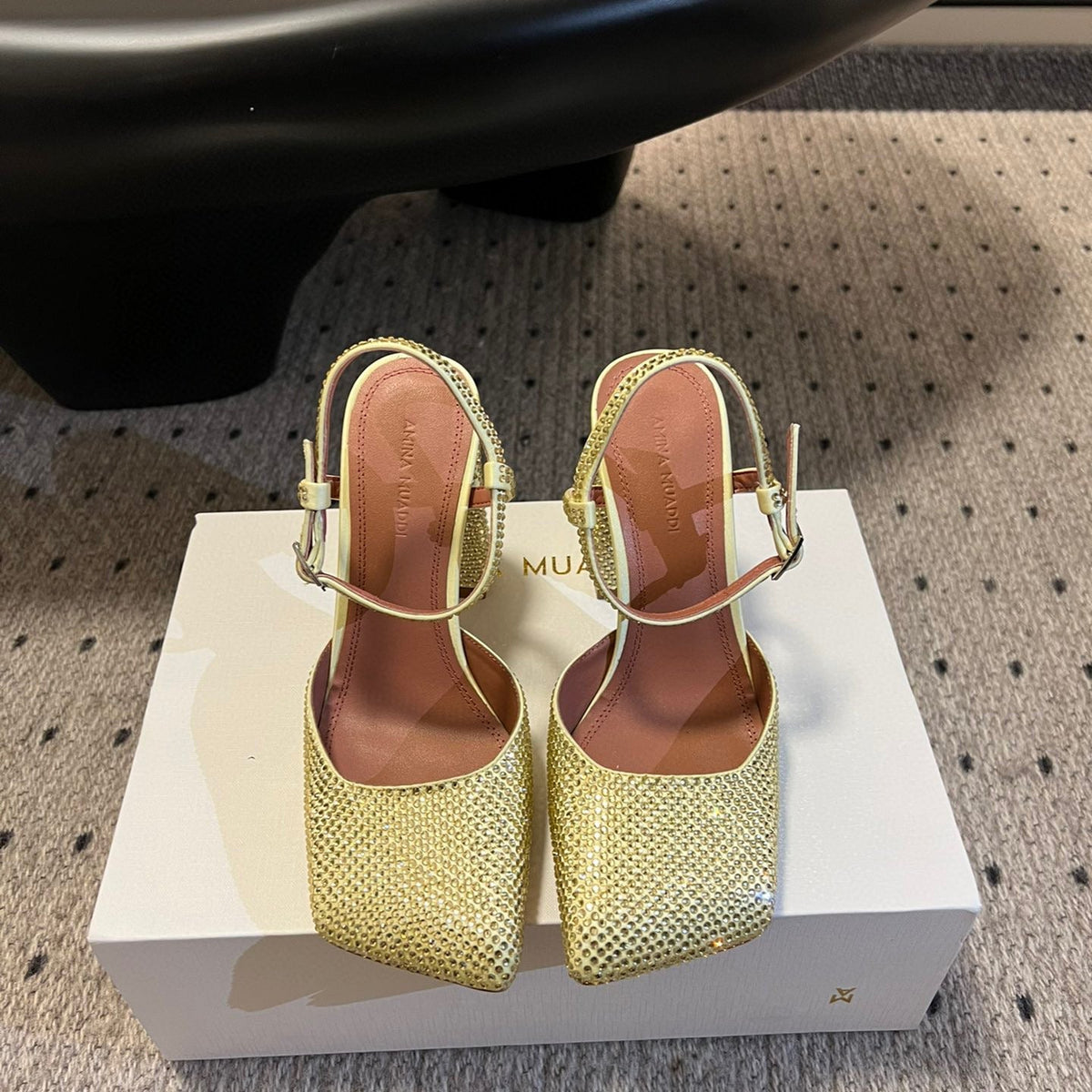 AMINA M HEELS