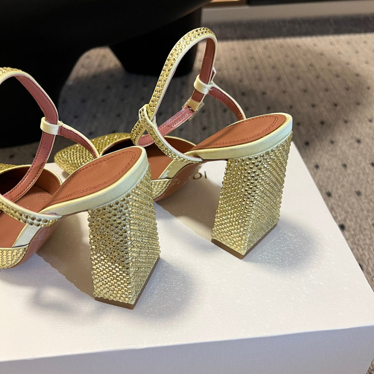 AMINA M HEELS