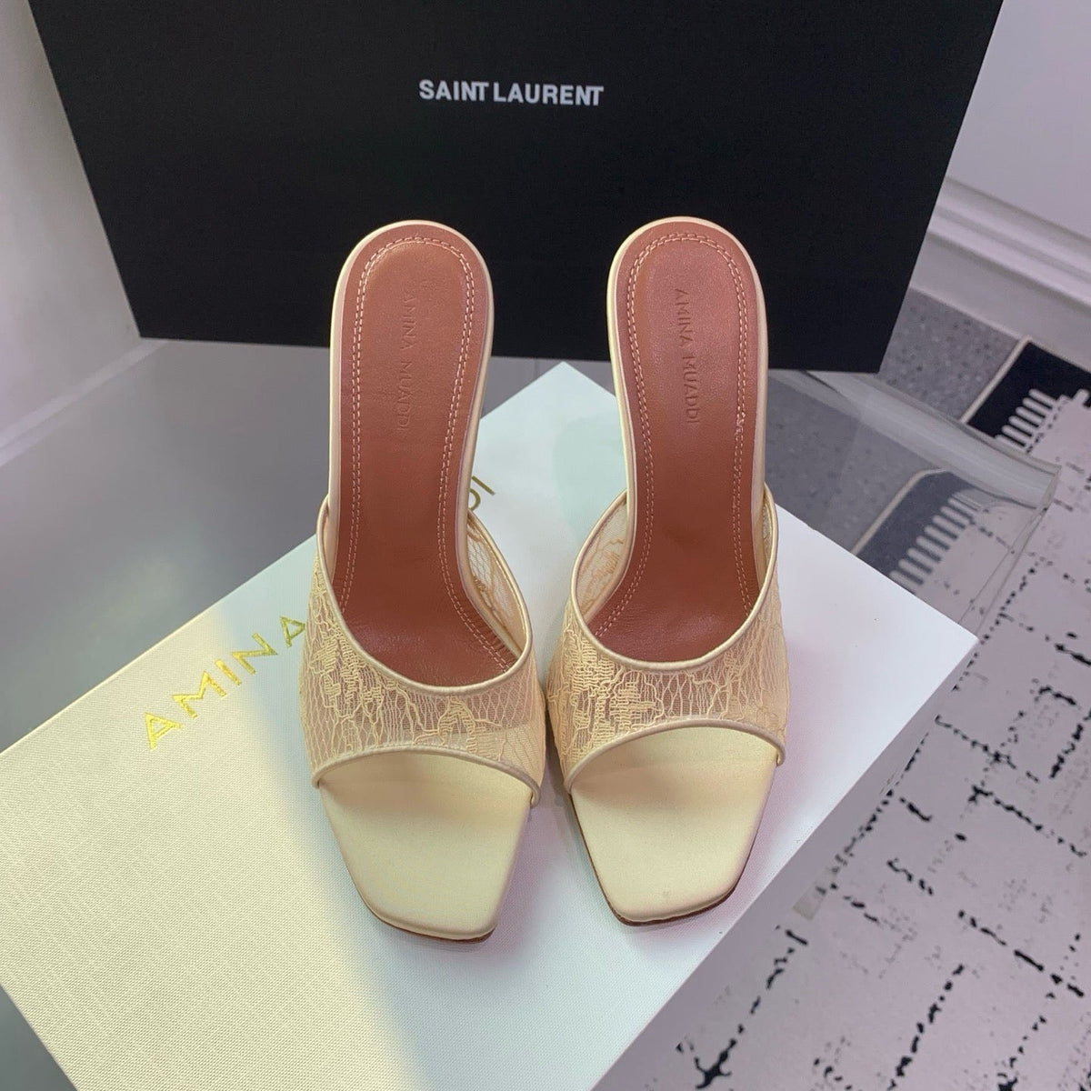 AMINA M HEELS