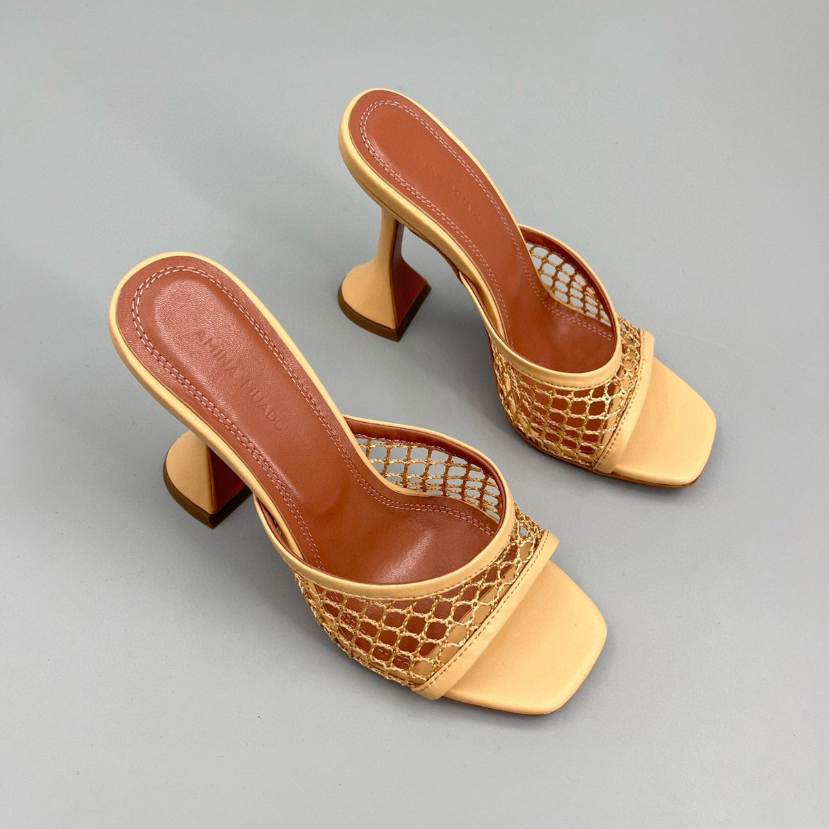 AMINA M HEELS