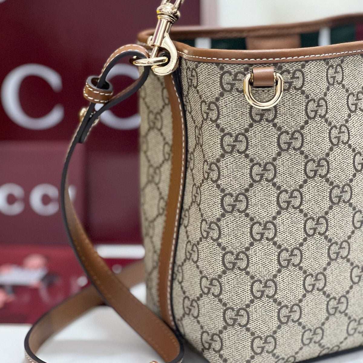 GG EMBLEM MINI BUCKET BAG