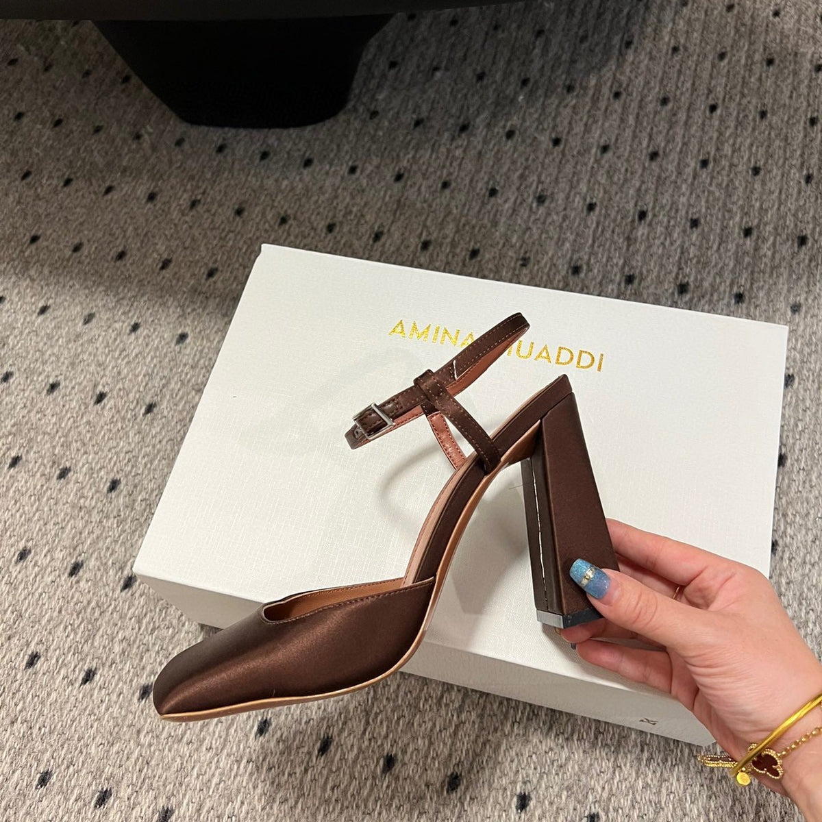 AMINA M HEELS