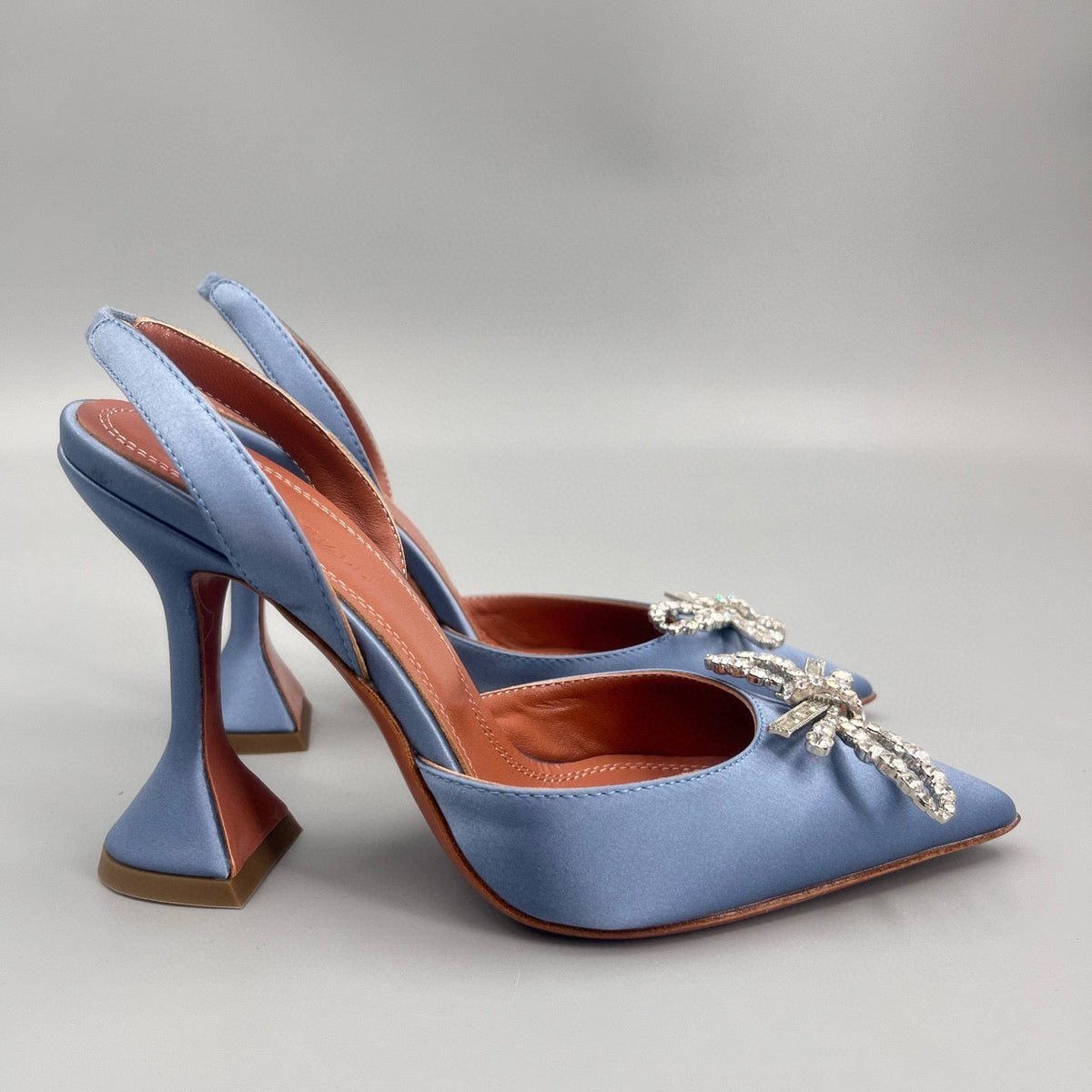 AMINA M HEELS
