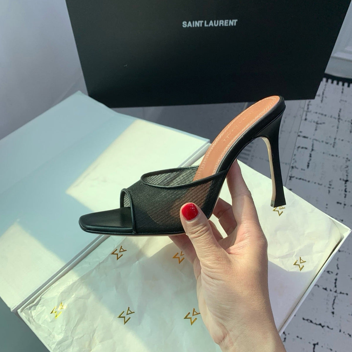 AMINA M HEELS