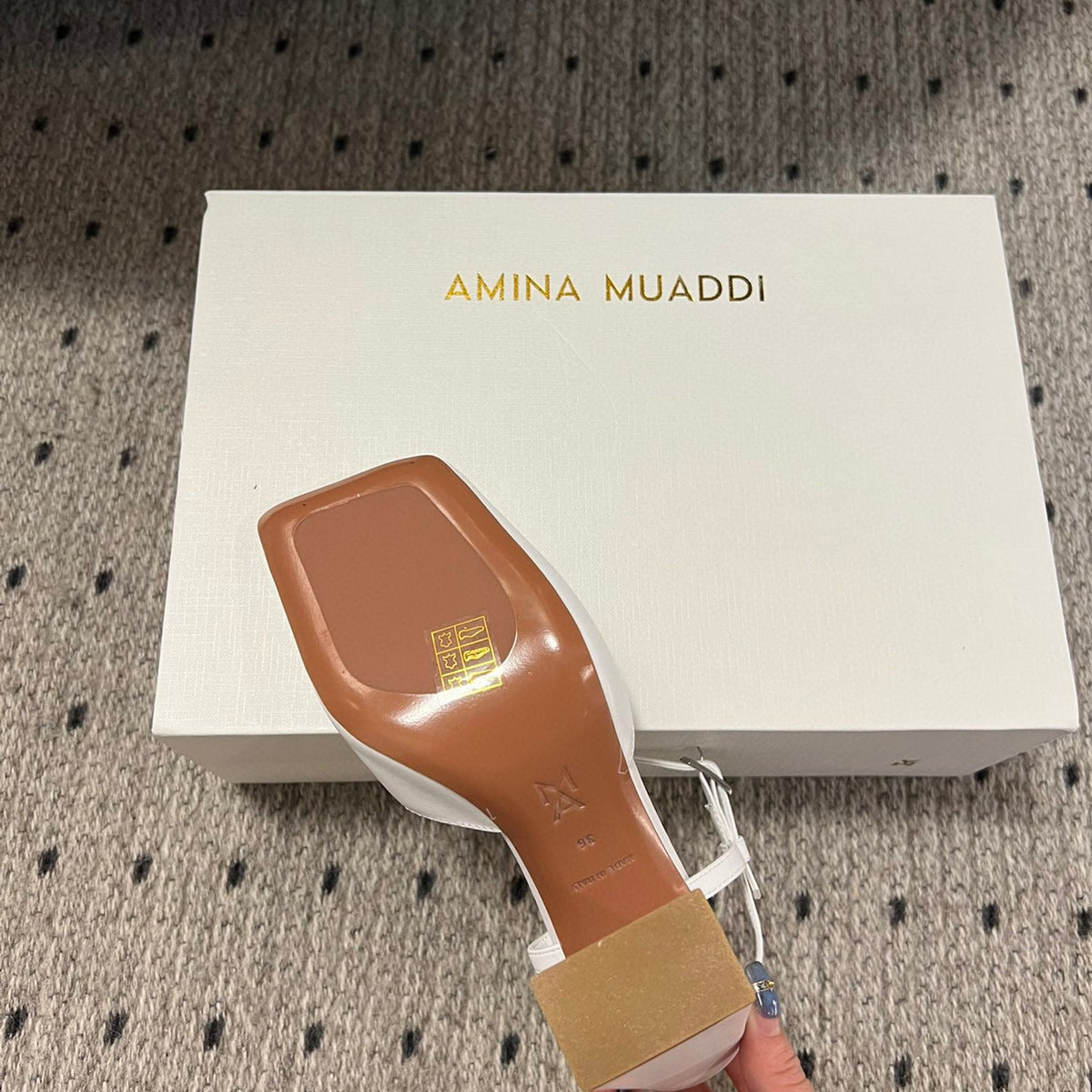 AMINA M HEELS