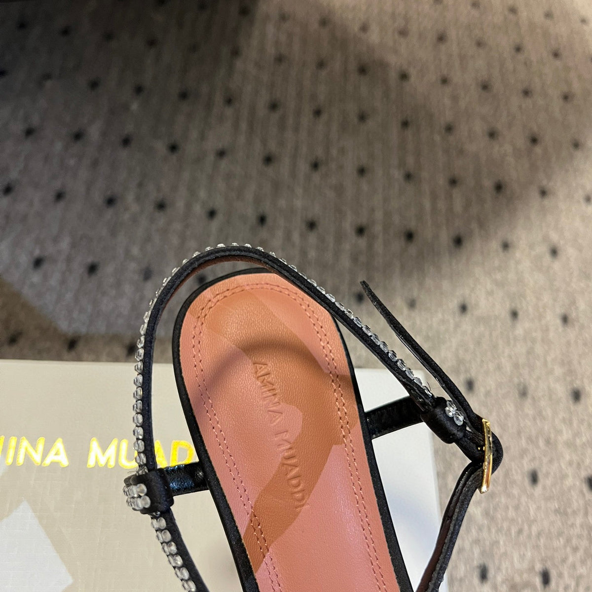 AMINA M HEELS