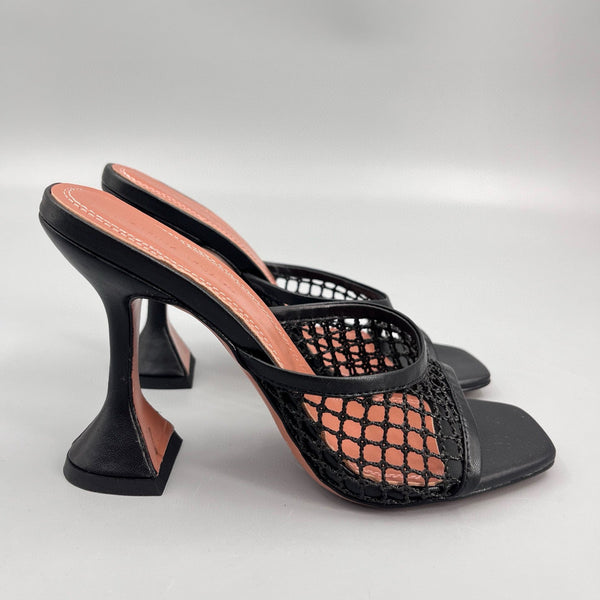 AMINA M HEELS