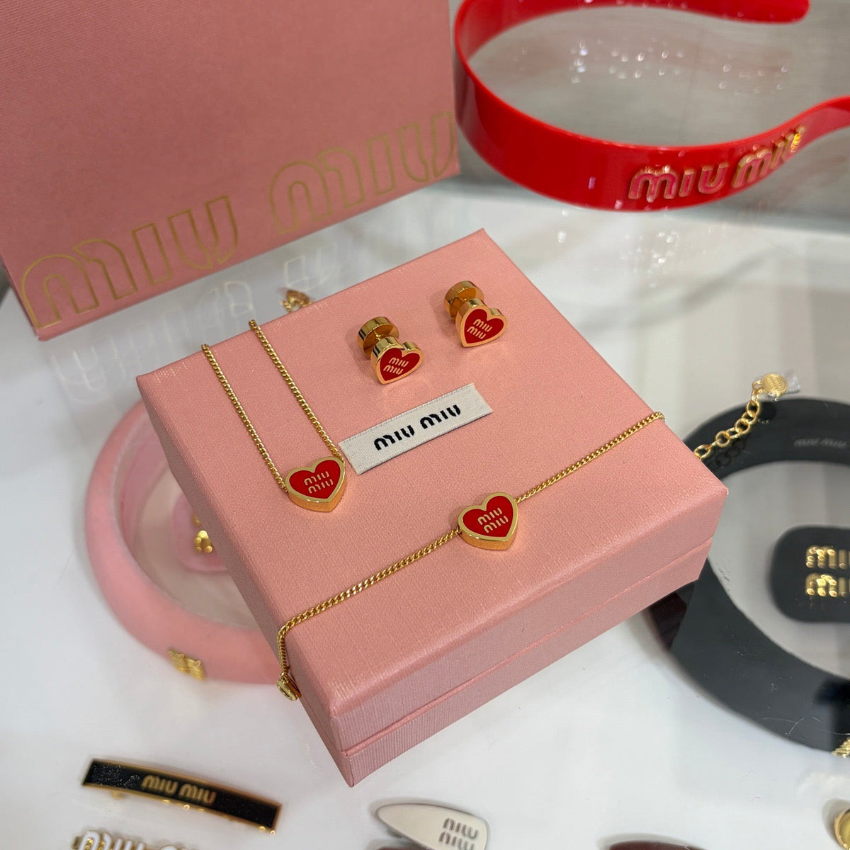 MIU M EARRINGS