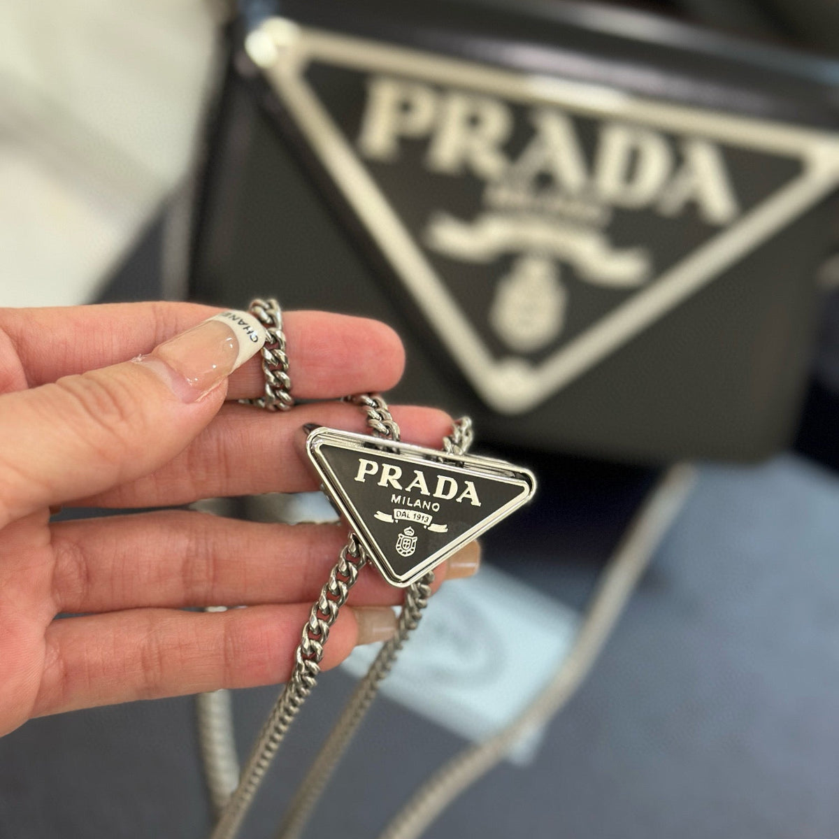 PD TRIANGLE LOGO BUFFED SHOULDER BAG