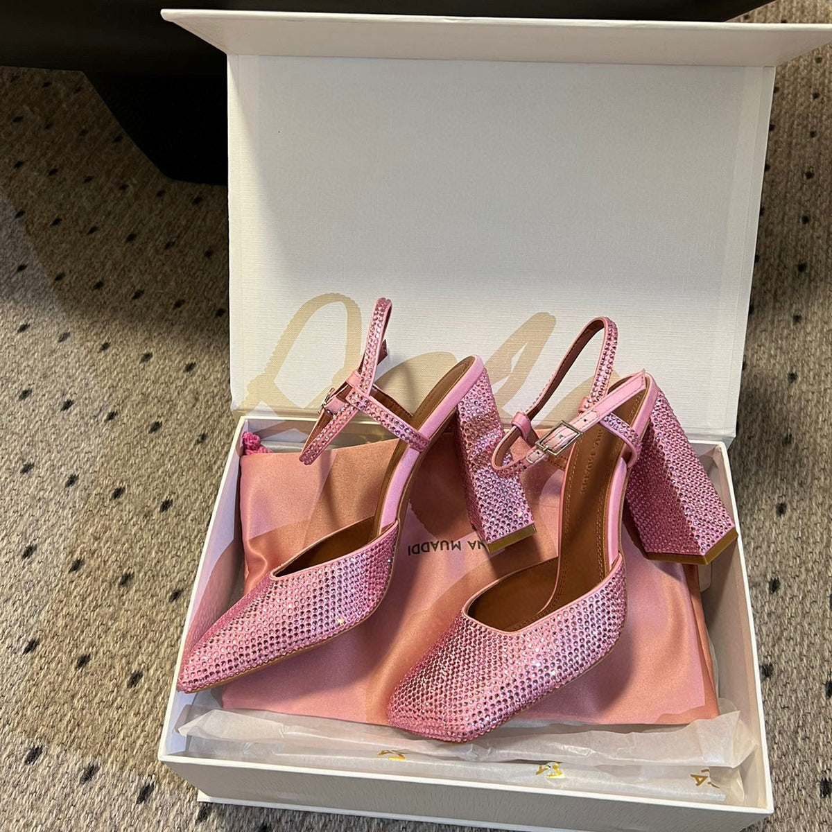 AMINA M HEELS