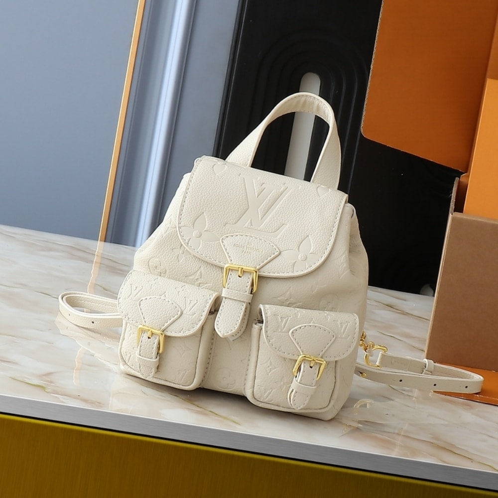 LV BACKUP MONOGRAM EMPREINTE LEATHER CREAM 20CM M47106