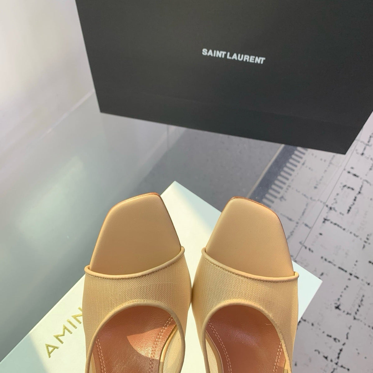 AMINA M HEELS