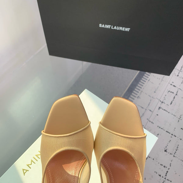 AMINA M HEELS
