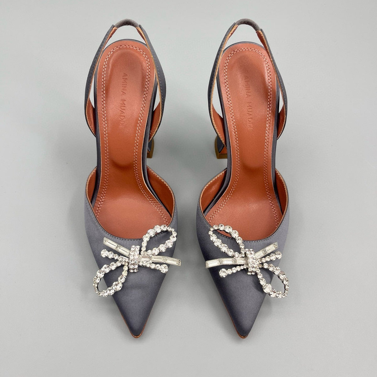 AMINA M HEELS