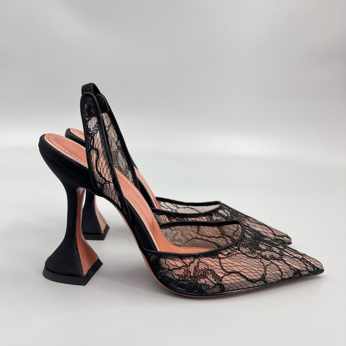 AMINA M HEELS
