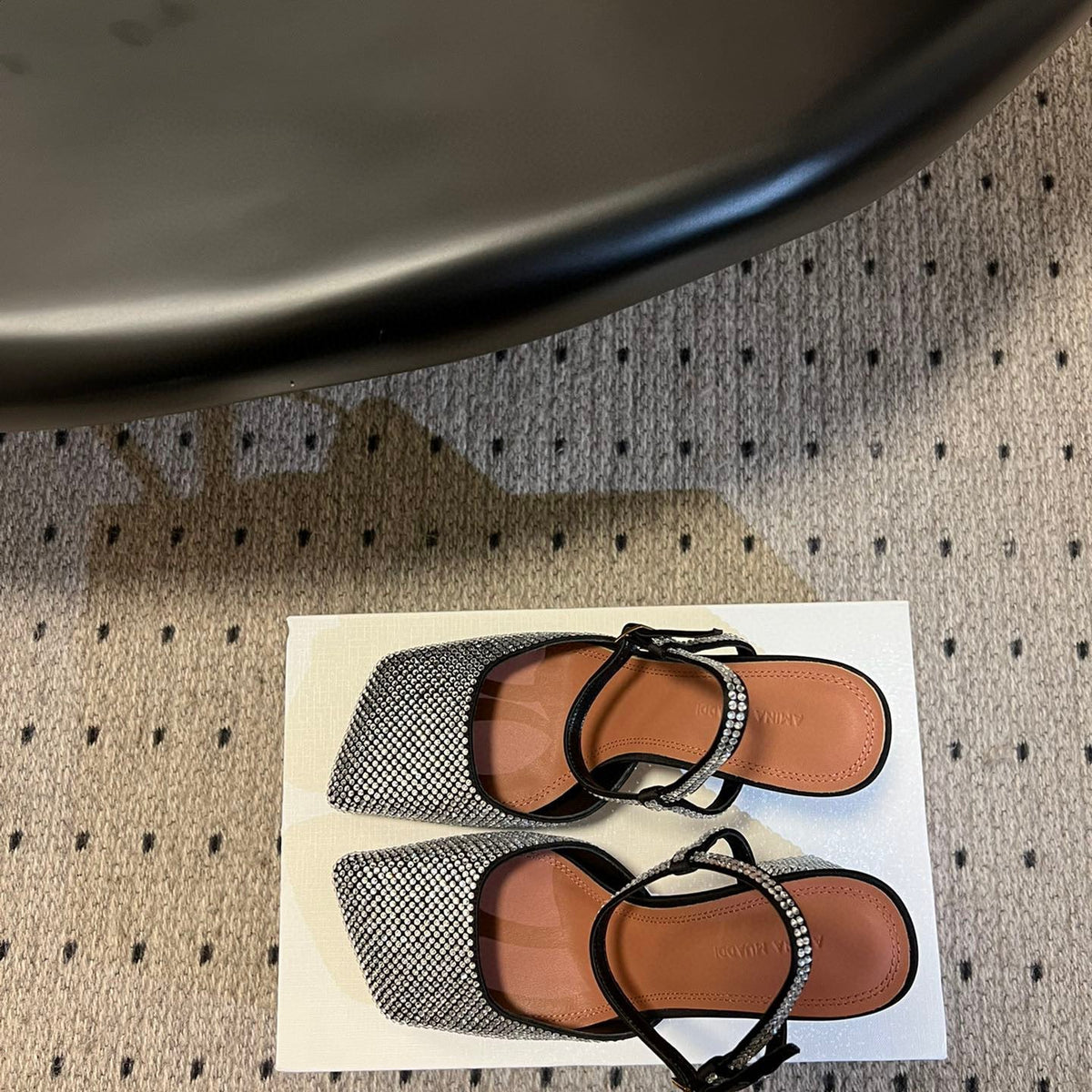 AMINA M HEELS