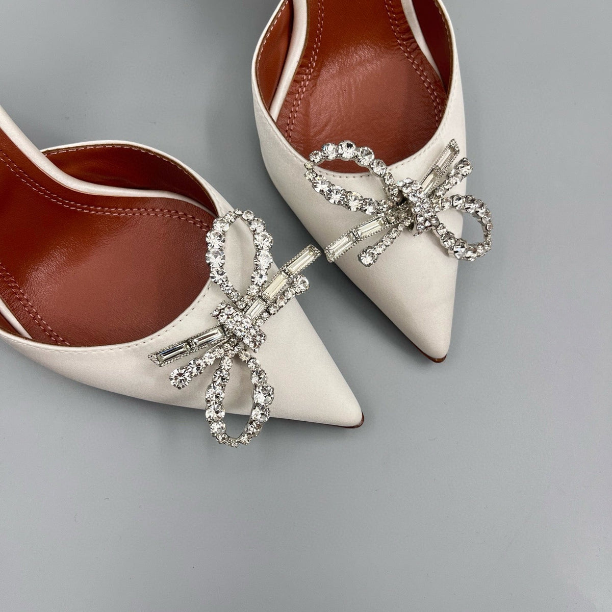 AMINA M HEELS
