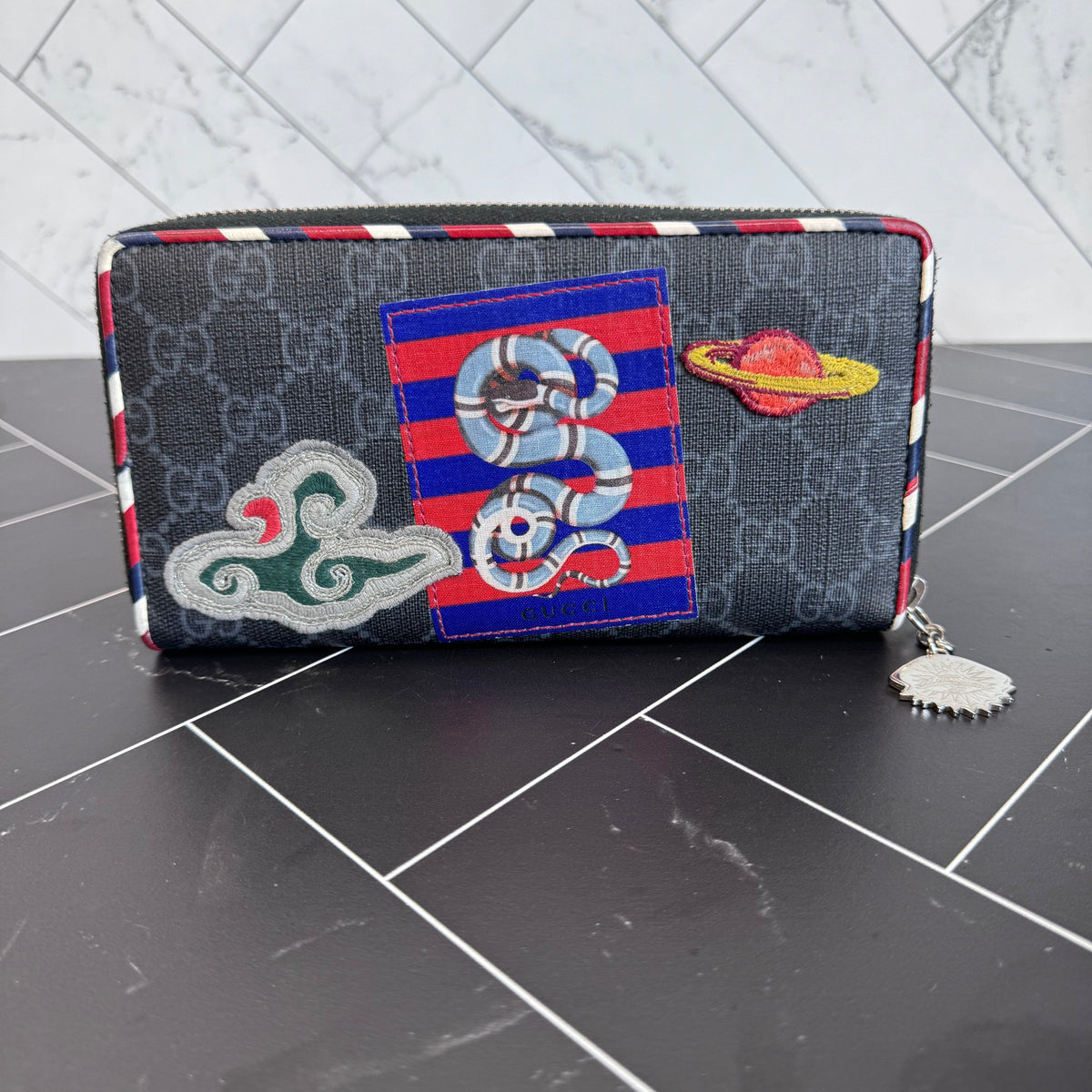 Gucci Canvas Courier Zippy Wallet