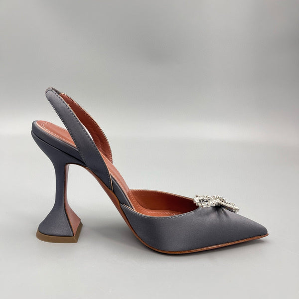 AMINA M HEELS