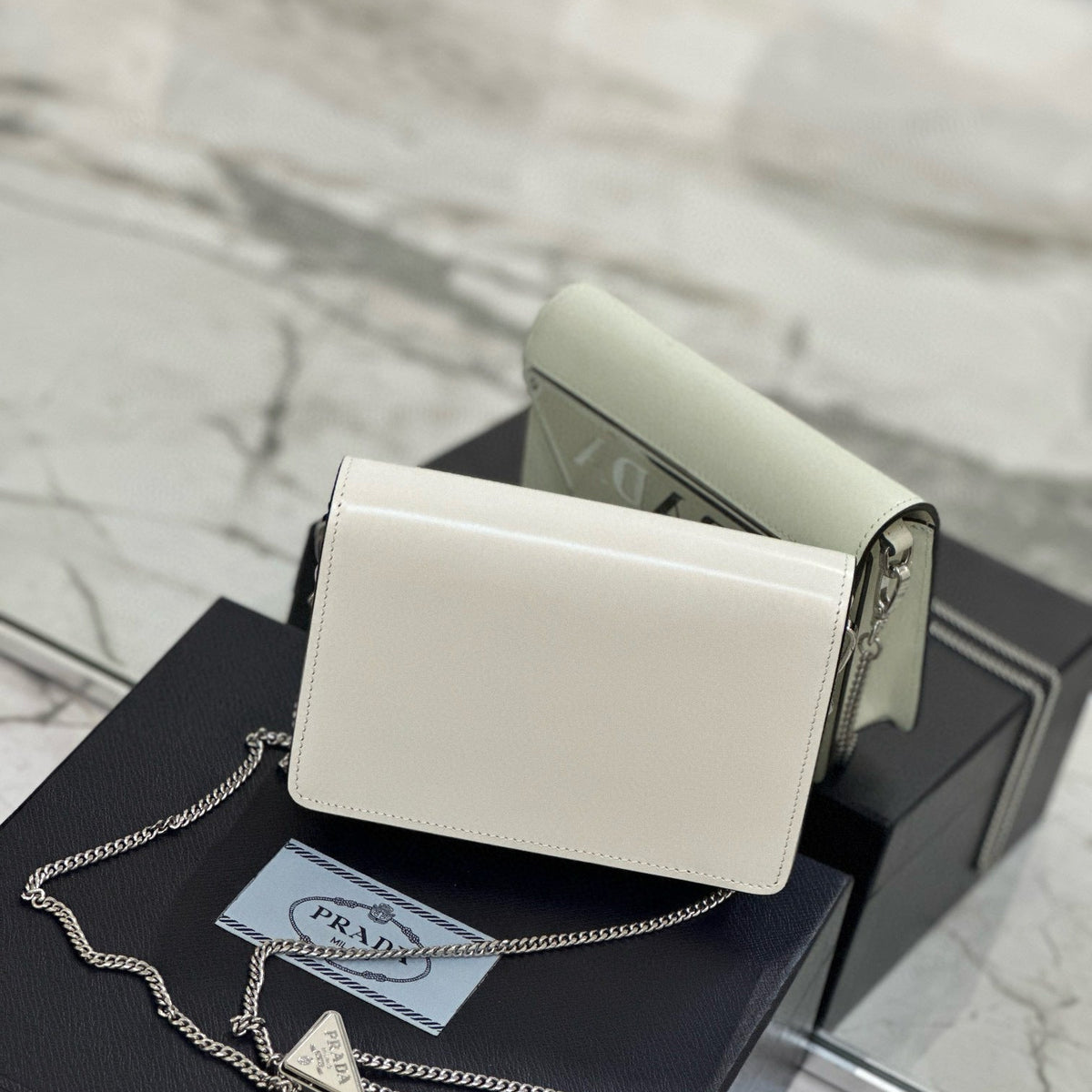 PD TRIANGLE LOGO BUFFED SHOULDER BAG