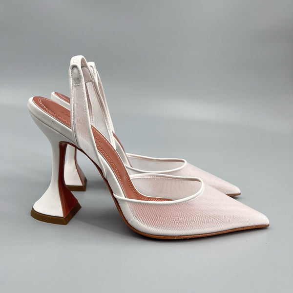 AMINA M HEELS
