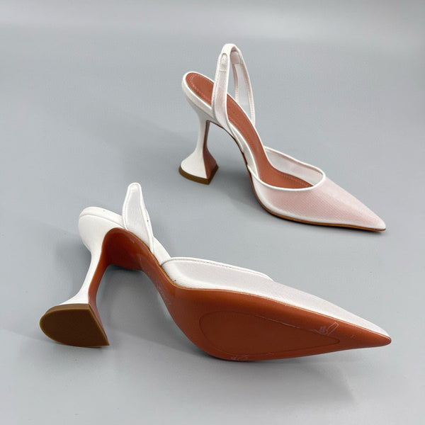 AMINA M HEELS