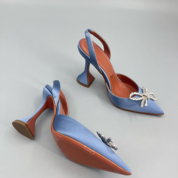 AMINA M HEELS