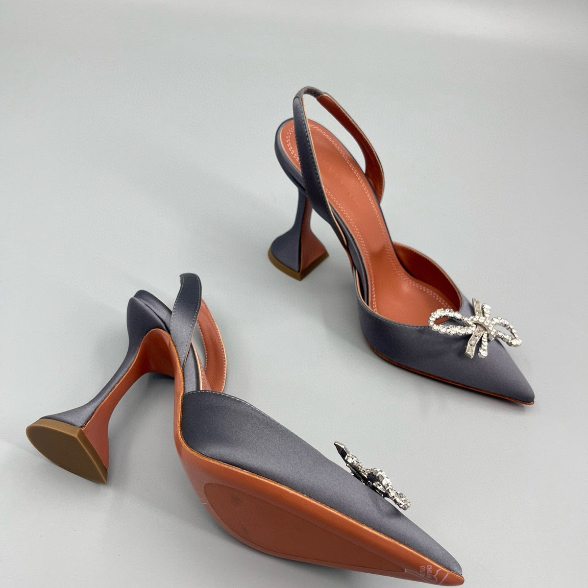 AMINA M HEELS