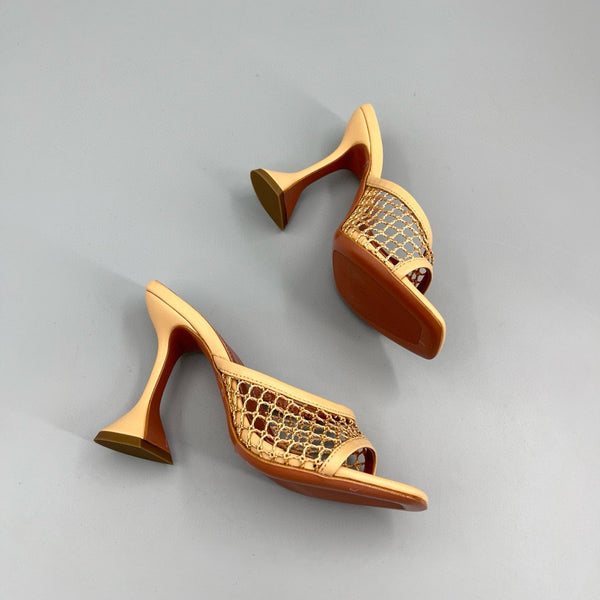 AMINA M HEELS