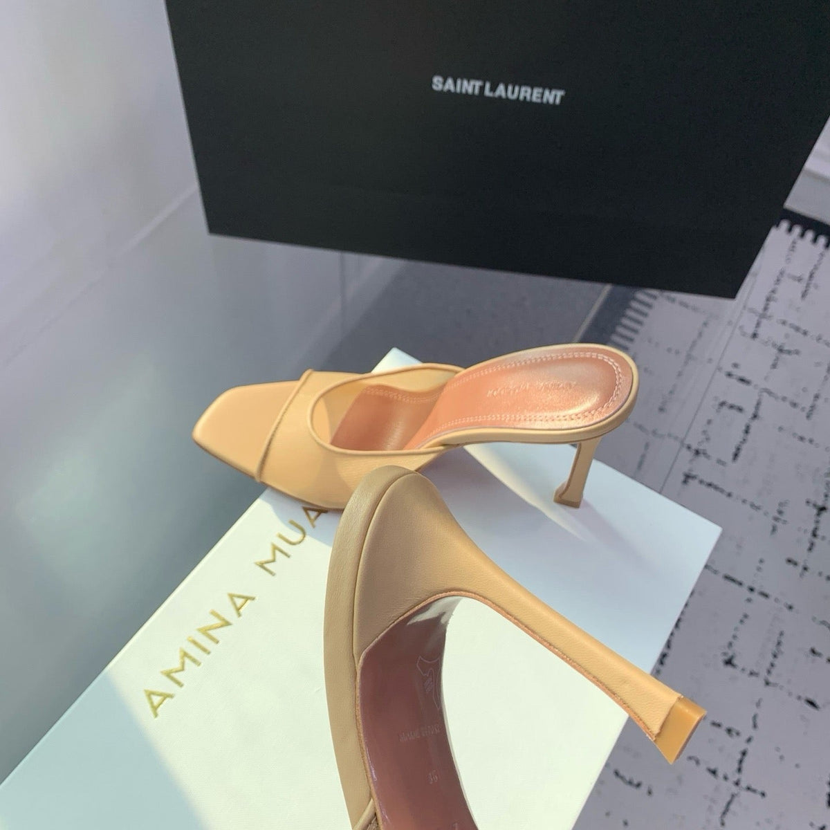 AMINA M HEELS