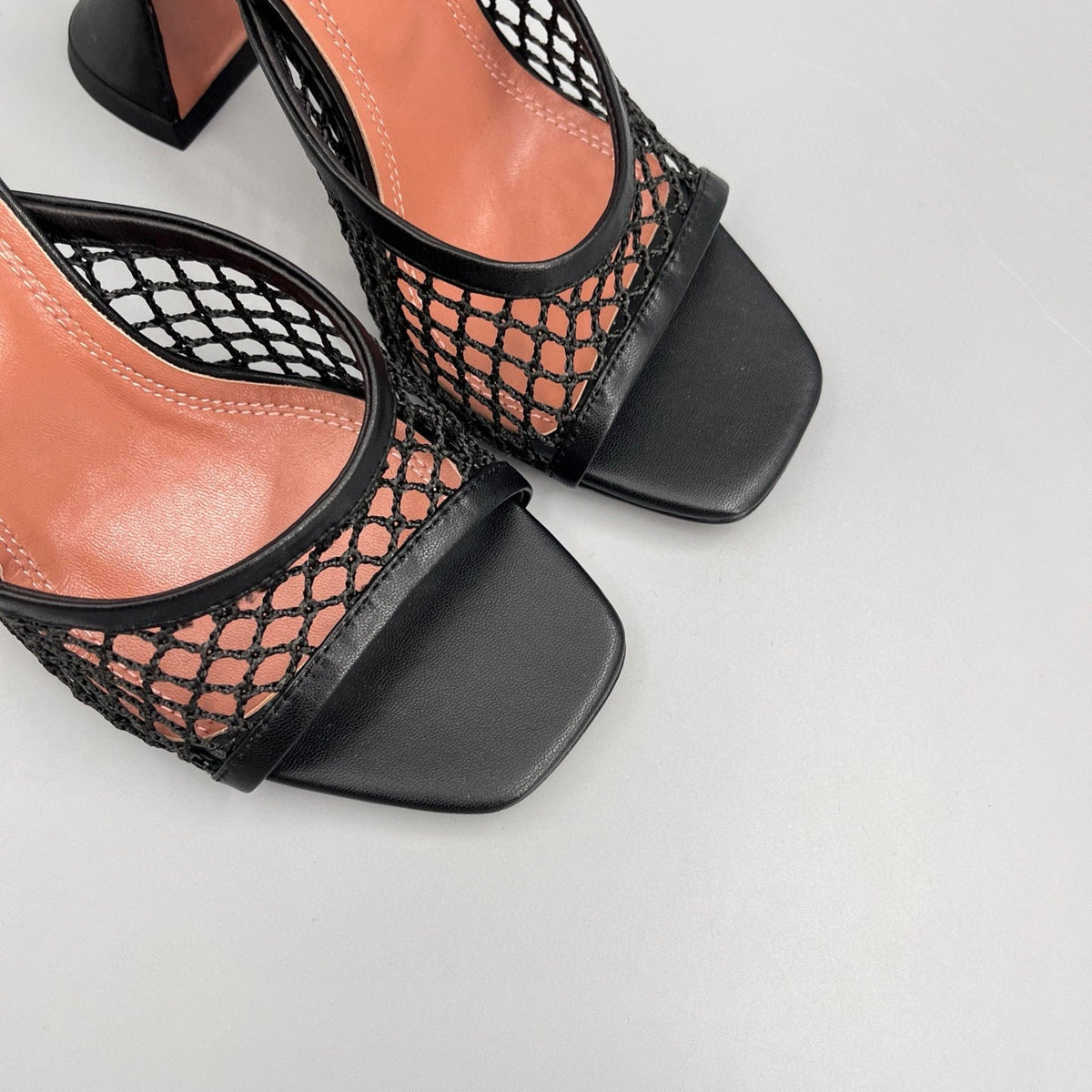 AMINA M HEELS