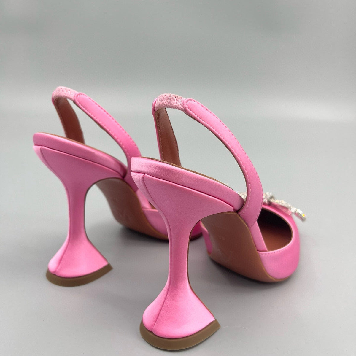 AMINA M HEELS