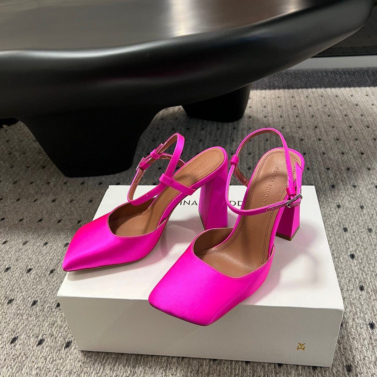 AMINA M HEELS