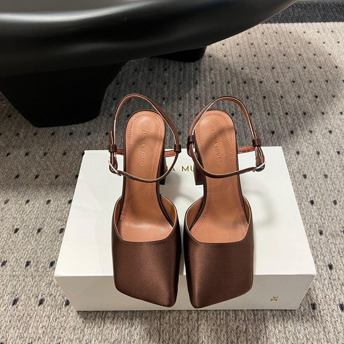 AMINA M HEELS