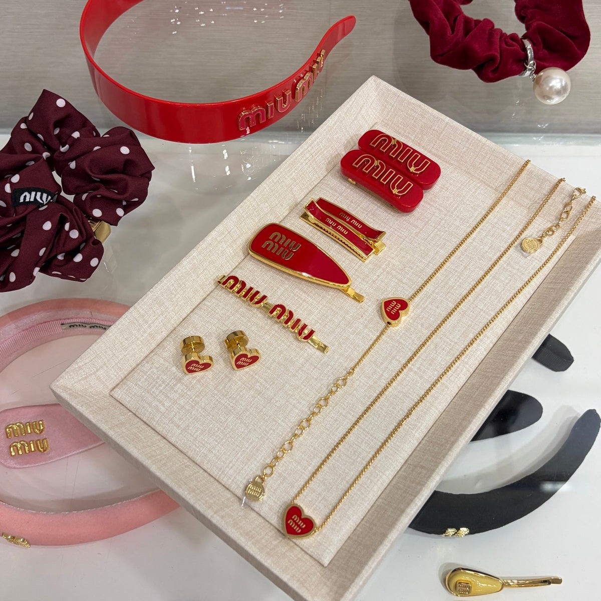 MIU M EARRINGS