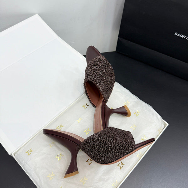 AMINA M HEELS
