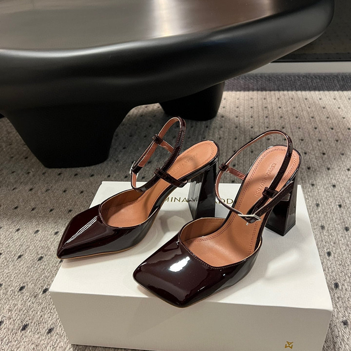 AMINA M HEELS