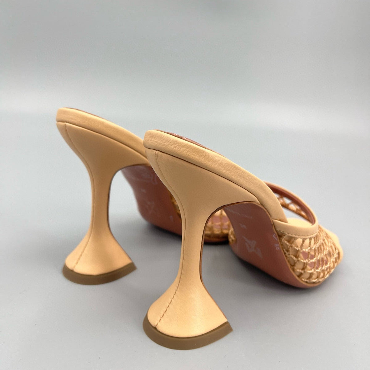 AMINA M HEELS