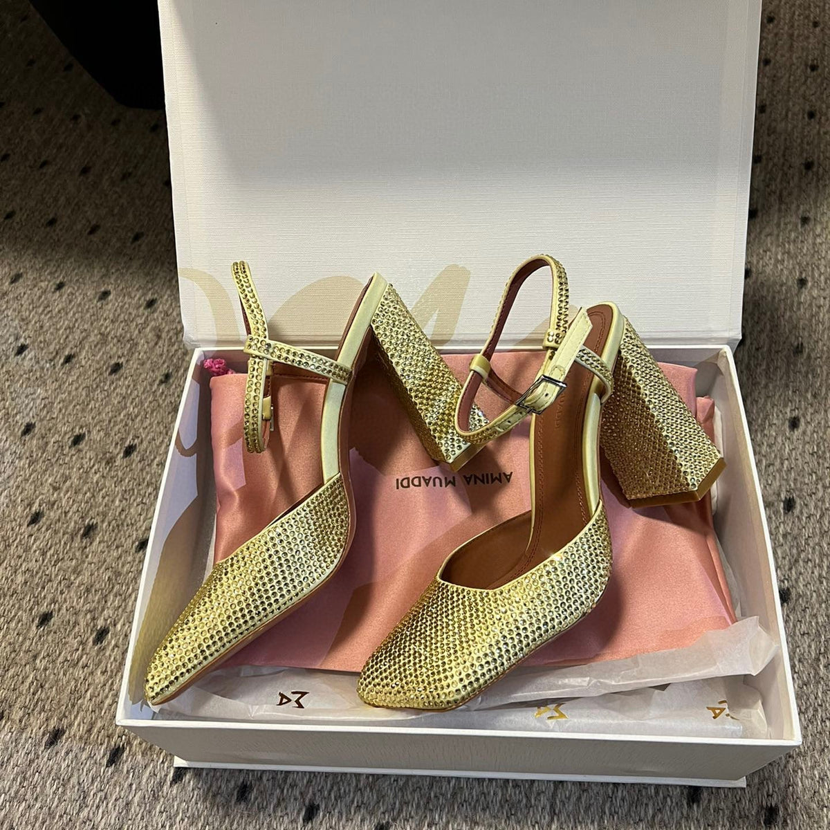 AMINA M HEELS