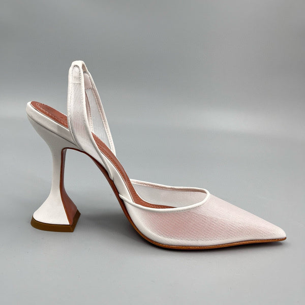 AMINA M HEELS