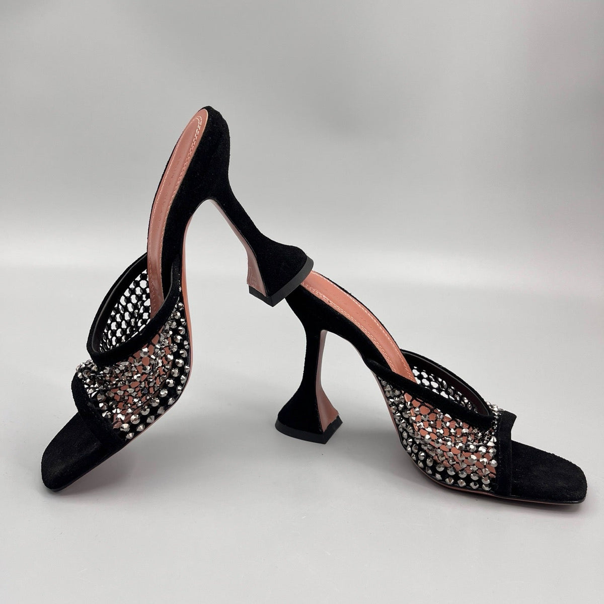 AMINA M HEELS