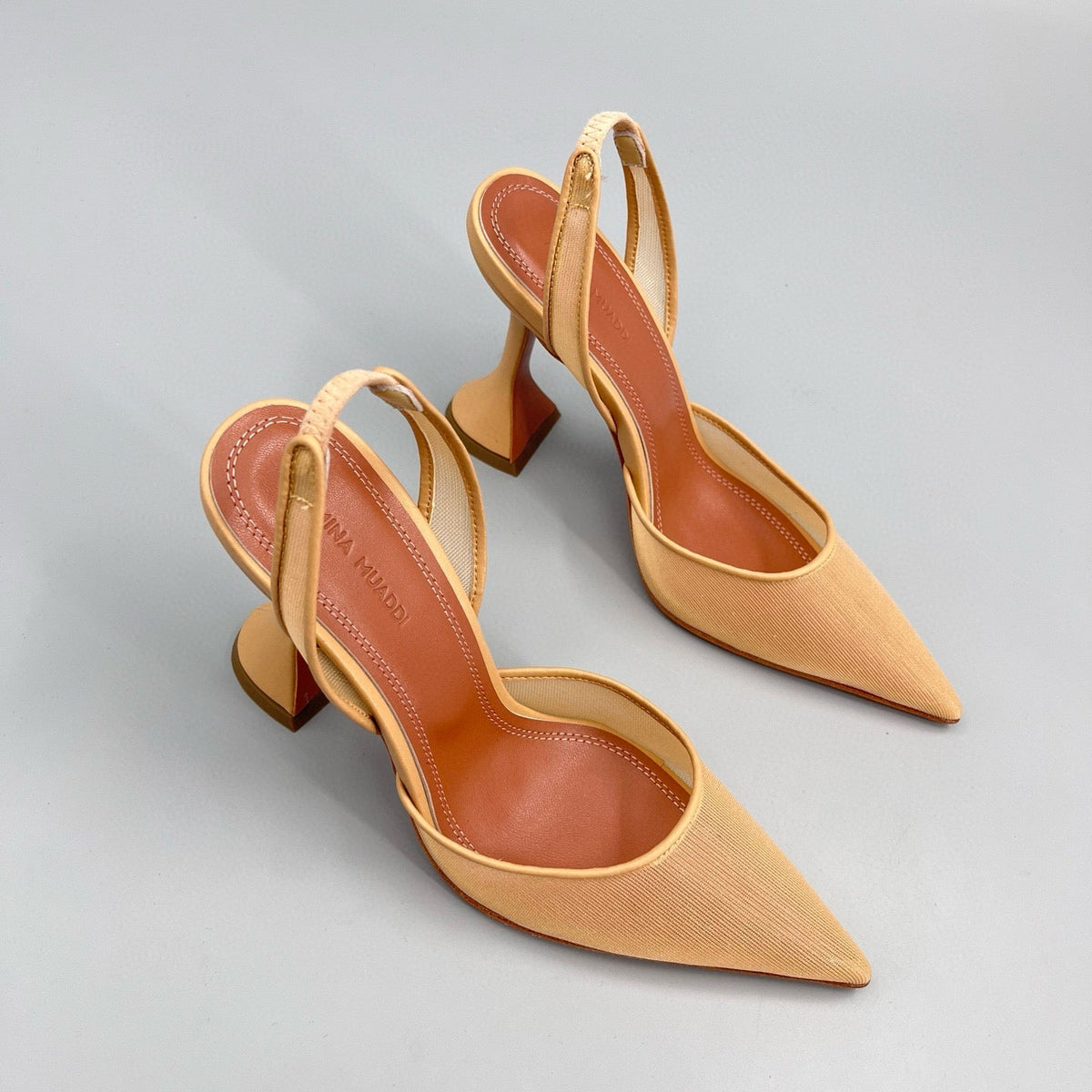AMINA M HEELS
