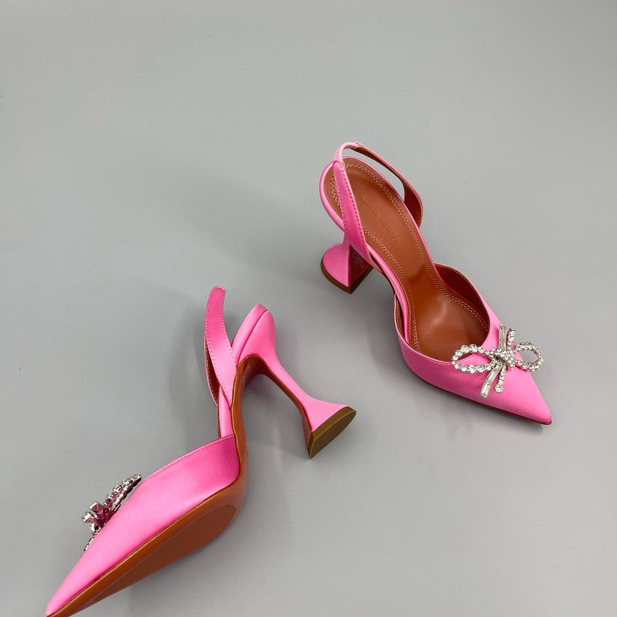 AMINA M HEELS