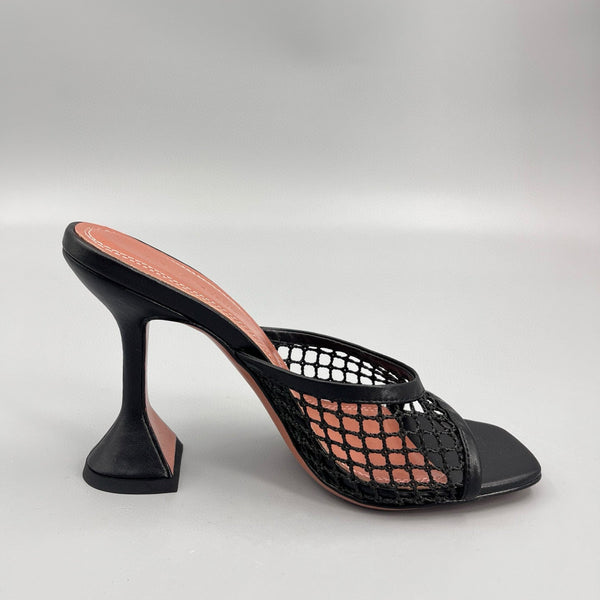 AMINA M HEELS