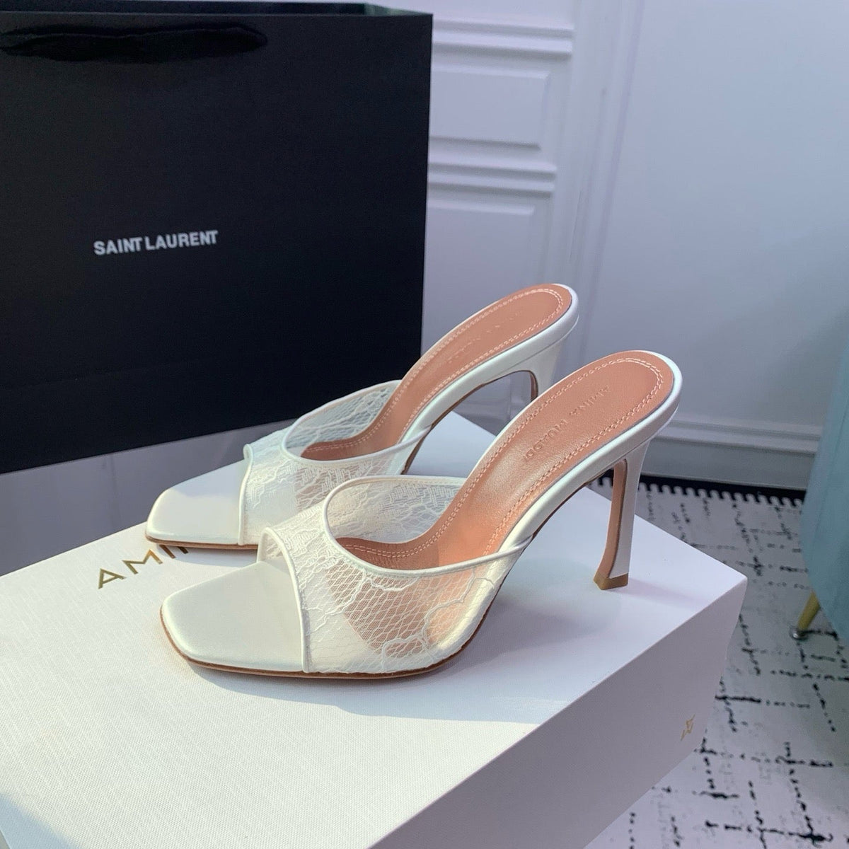 AMINA M HEELS