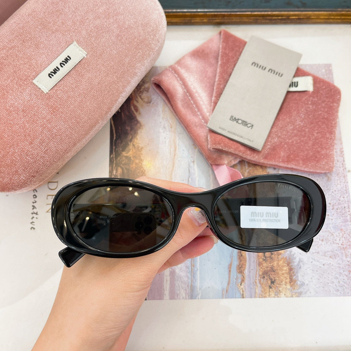MIU M SUNGLASSES