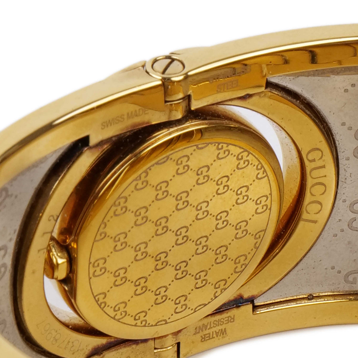 Gucci Twirl Reversible Gold Bracelet Watch.