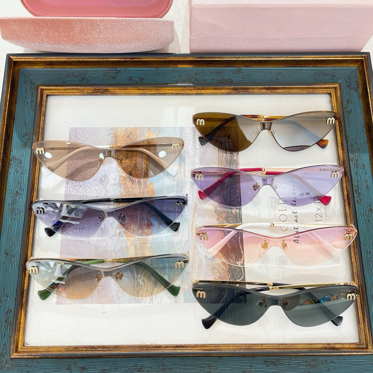 MIU M SUNGLASSES