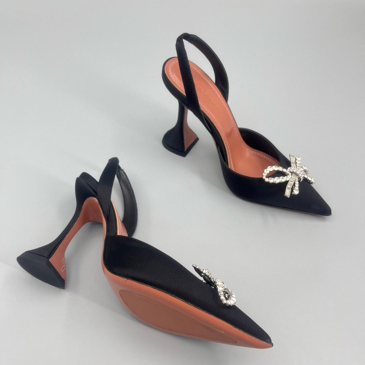 AMINA M HEELS