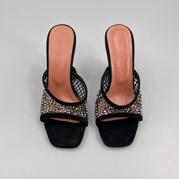 AMINA M HEELS